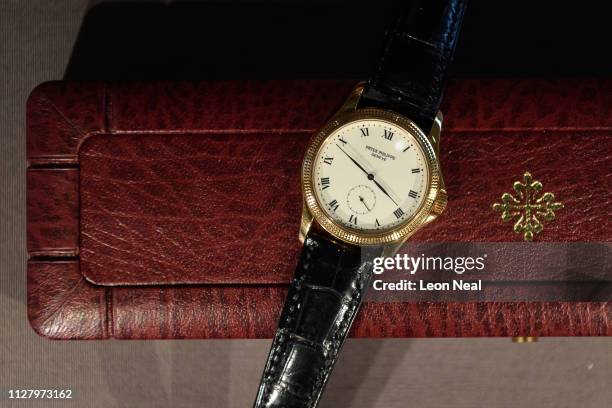 Patek Philippe wristwatch formally owned by Nelson Mandela is seen at a press preview of "Mandela: The Official Exhibition" at 26 Leake Street on...