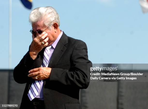 Fred Quintana, a Vietnam veteran, begins to cry after releasing a dove during the ceremony. He said he has names of friends and family on the...
