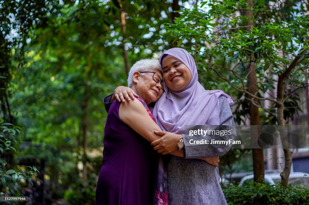 A hug says it all, multi-racial togetherness and strength