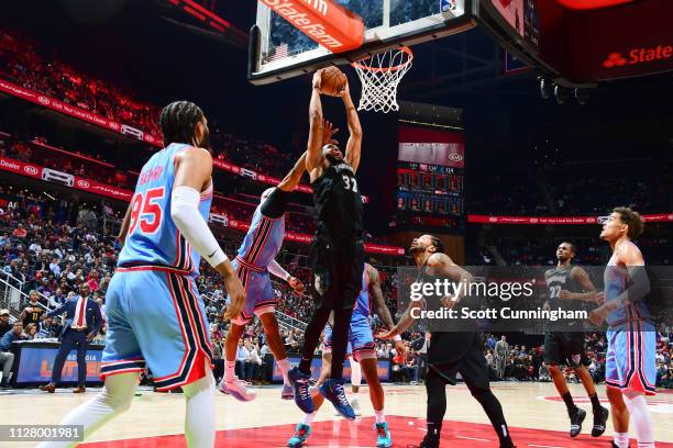 Karl-Anthony Towns of the Minnesota Timberwolves goes up for a dunk against the Atlanta Hawks on February 27, 2019 at State Farm Arena in Atlanta,...