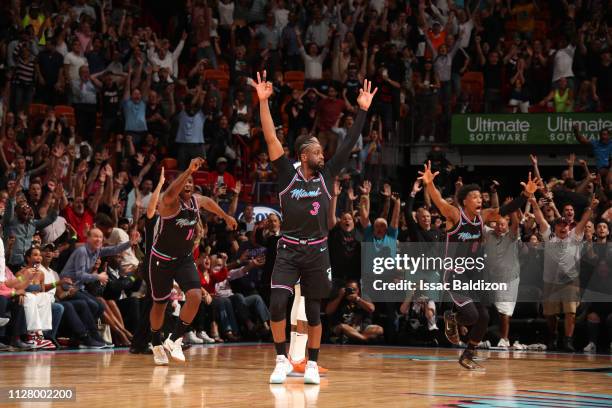 Dwyane Wade of the Miami Heat reacts to hitting the game-winning three-point shot against the Golden State Warriors on February 27, 2019 at American...