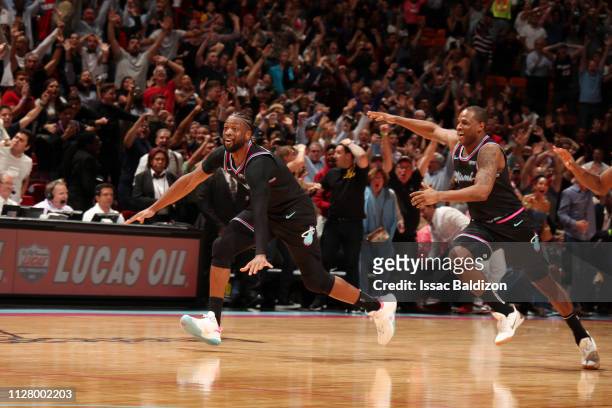 Dwyane Wade of the Miami Heat reacts to hitting the game-winning three-point shot against the Golden State Warriors on February 27, 2019 at American...