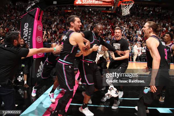 Dwyane Wade of the Miami Heat reacts to hitting the game-winning three-point shot against the Golden State Warriors on February 27, 2019 at American...