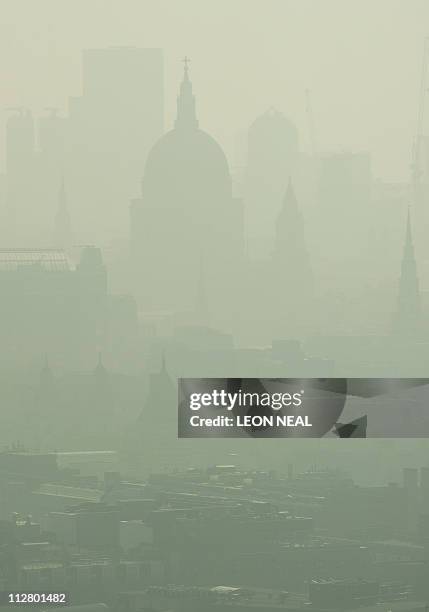 St. Paul's Cathedral is seen among the skyline through the smog in central London on April 22, 2011. The British Government have warned of...