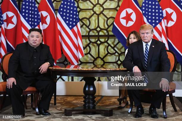President Donald Trump and North Korea's leader Kim Jong Un hold a meeting during the second US-North Korea summit at the Sofitel Legend Metropole...