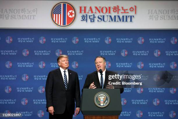 Mike Pompeo, U.S. Secretary of state, right, speaks as U.S. President Donald Trump, looks on during a news conference following the DPRK-USA Hanoi...