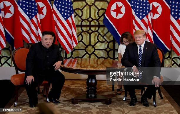 In this handout photo provided by Vietnam News Agency, U.S. President Donald Trump and North Korean leader Kim Jong-un during their second summit...