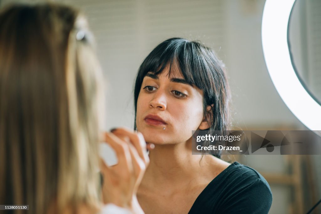 Millennial generation Latina starting her make up school
