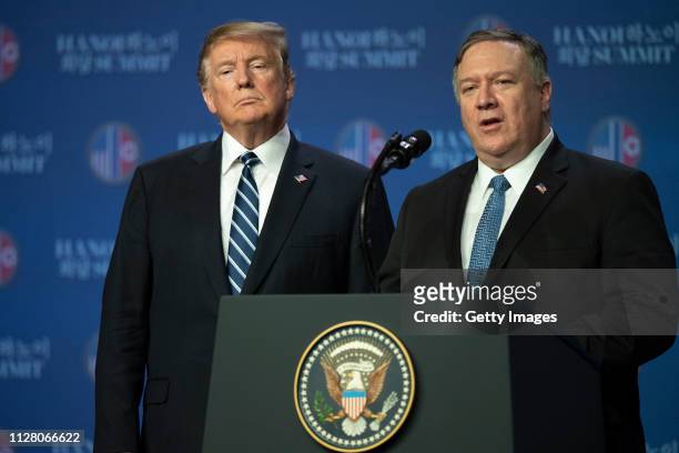 Secretary of state, Mike Pompeo, speaks at a news conference while U.S. President Donald Trump looks on following his second summit meeting with...