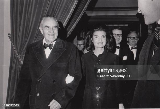 Former New York State Governor William Averell Harriman escorts former First Lady Jacqueline Kennedy at a Democratic fundraising dinner at the Plaza...