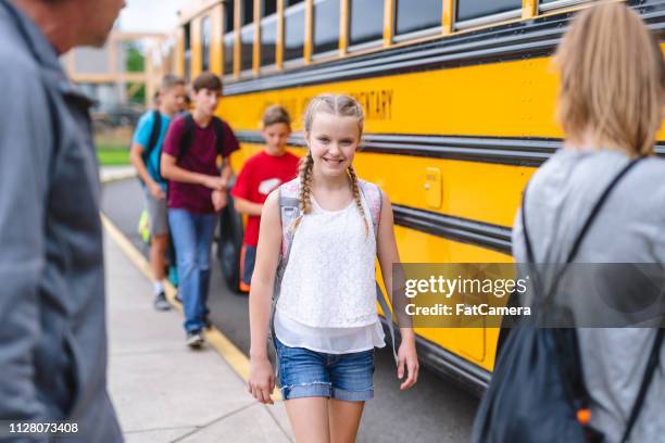 Getting Off Teenager Getting Off Bus Photos and Premium High Res Pictures - Getty ...
