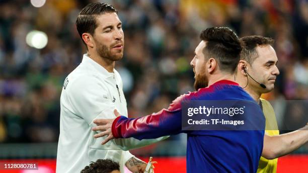 Sergio Ramos of Real Madrid and Lionel Messi of FC Barcelona gesture prior to the Copa del Semi Final match second leg between Real Madrid and...