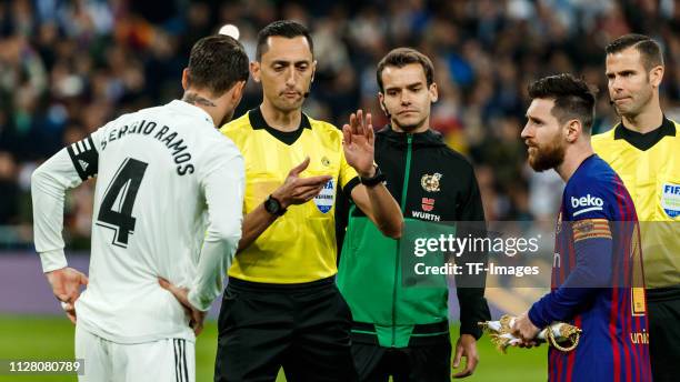 Sergio Ramos of Real Madrid and Lionel Messi of FC Barcelona gesture prior to the Copa del Semi Final match second leg between Real Madrid and...