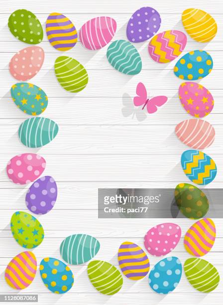 stockillustraties, clipart, cartoons en iconen met pasen achtergrond met kleurrijke eieren op houten achtergrond - easter table