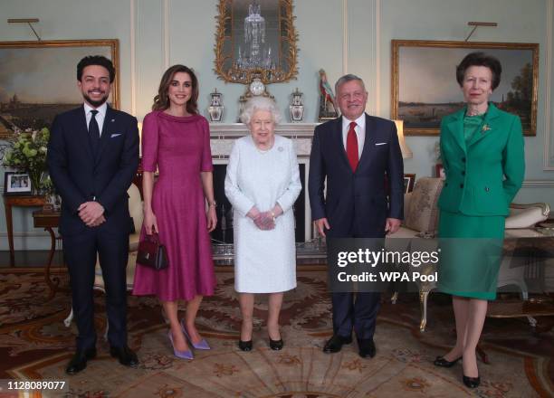 Queen Elizabeth II with Crown Prince Hussein of Jordan, Queen Rania of Jordan, King Abdullah II of Jordan and Princess Anne, Princess Royal during a...
