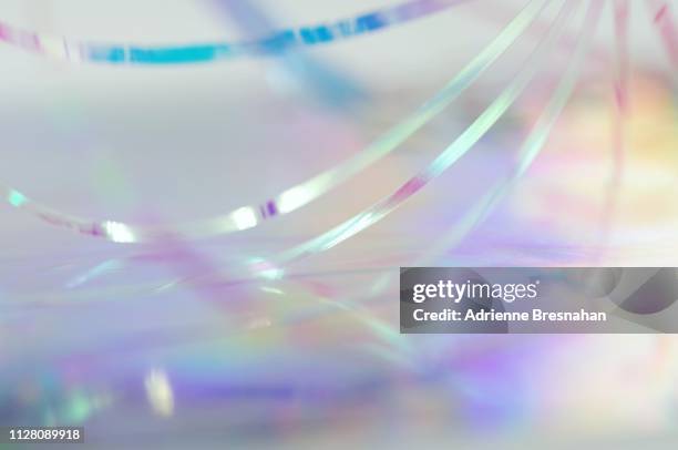 metallic ribbon with pastel holographic light effects - reflektor stock-fotos und bilder