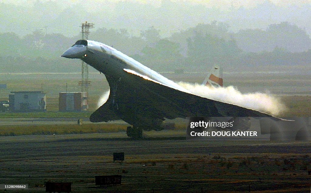 Concrode Elevons A British Airways Concorde touches down at New York's John F. Kennedy ...