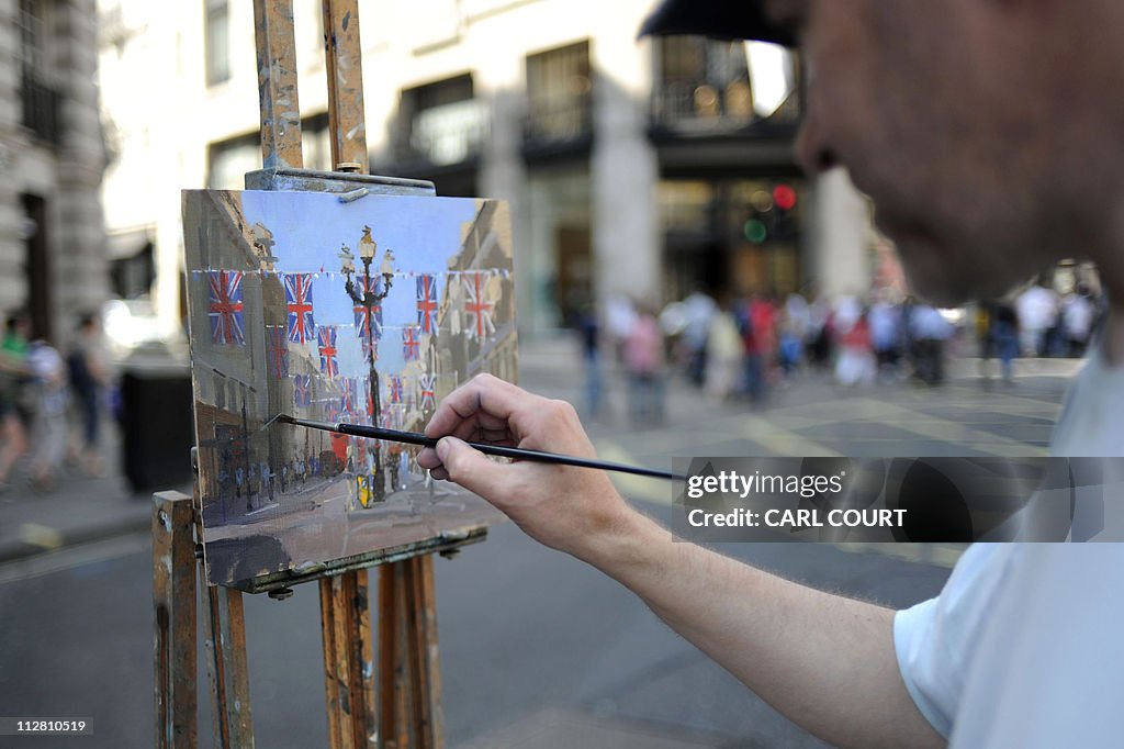 Oil painter Roy Connelly works on a pain