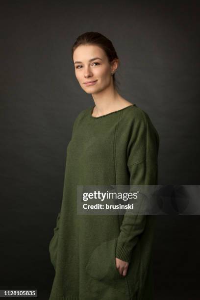 studio portrait of an attractive 20 year old woman - portrait on black background stock pictures, royalty-free photos & images