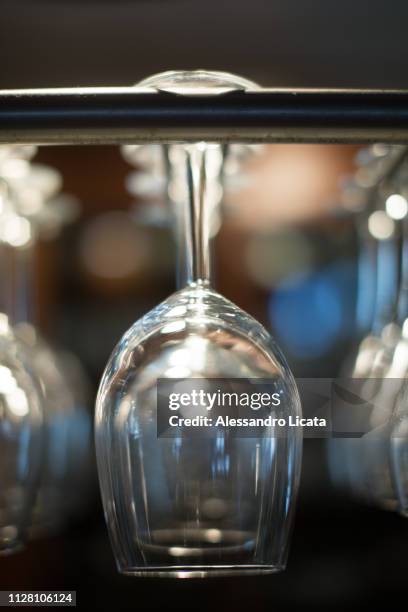 glasses hanging - bicchiere stock pictures, royalty-free photos & images