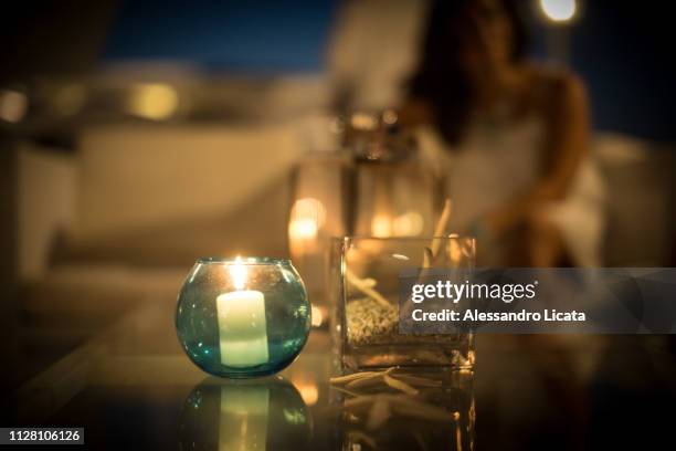 elegant candles and chic ornaments - sfondi stock-fotos und bilder