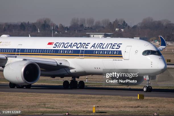 Singapore Airlines Airbus A350-900 airplane with registration 9V-SMF taxiing for take off in Düsseldorf International Airport DUS EDDL in Germany...