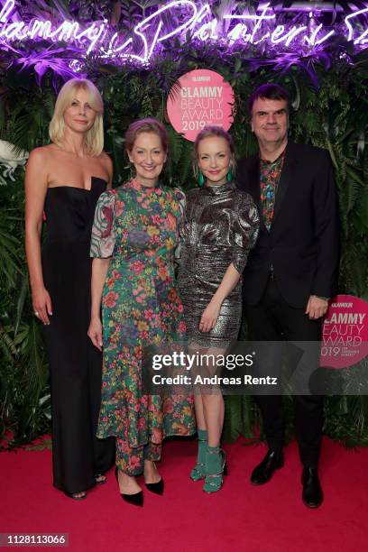 Glamour Beauty Director Stefanie Neureuter, Janin Ullmann and Glamour Publisher Andre Pollmann arrive at the Glammy Award on February 07, 2019 in...