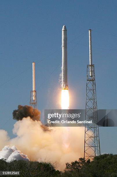 SpaceX's Falcon 9 rocket blasts off December 8, 2010 from Cape Canaveral, Florida carrying a Dragon capsule, which is designed to deliver up to...