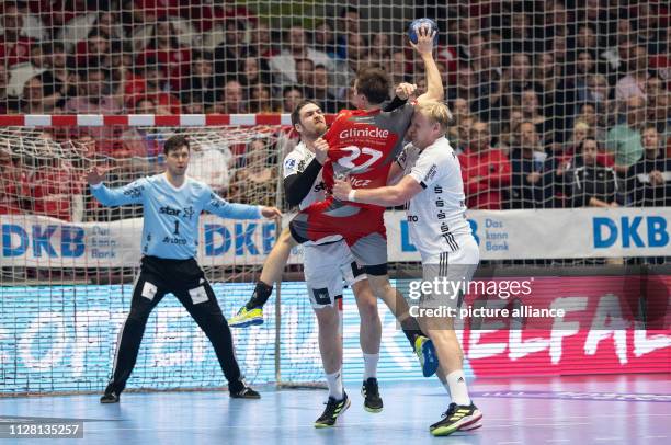 February 2019, Hessen, Kassel: Handball: Bundesliga, MT Melsungen - THW Kiel, 23rd matchday in the Rothenbach-Halle. Melsungen's Roman Sidorowicz...