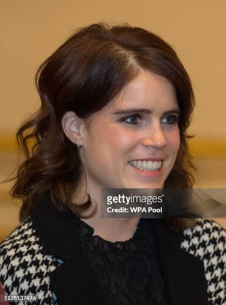 Princess Eugenie is seen during a viewing of a display of her wedding outfits in a new exhibition 'A Royal Wedding: HRH Princess Eugenie and Mr Jack...