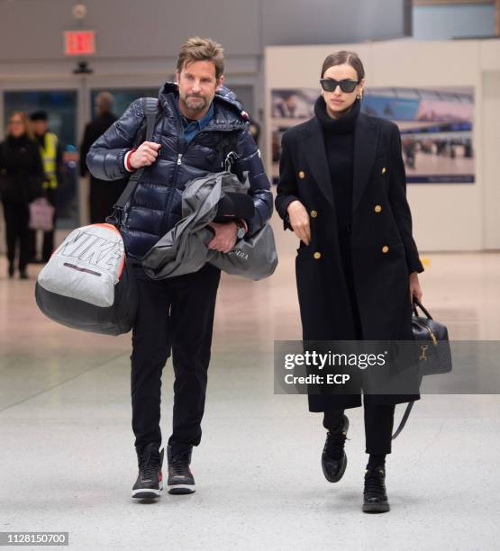 Bradley Cooper and Irina Shayk arrive at JFK airport on February 7, 2019 in New York City.