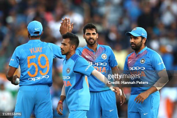 Bhuvneshwar Kumar of India celebrates the wicket of Tim Seifert of the Black Caps during game two of the International T20 Series between the New...