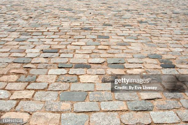 cobblestones - cobblestone texture stock pictures, royalty-free photos & images