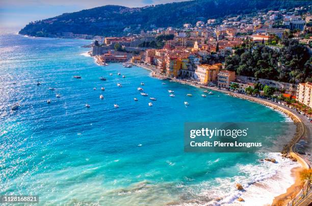 villefranche sur mer and its bay on the french riviera, on a windy winter day - south france stock pictures, royalty-free photos & images