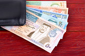 Jordanian Dinar in the black wallet