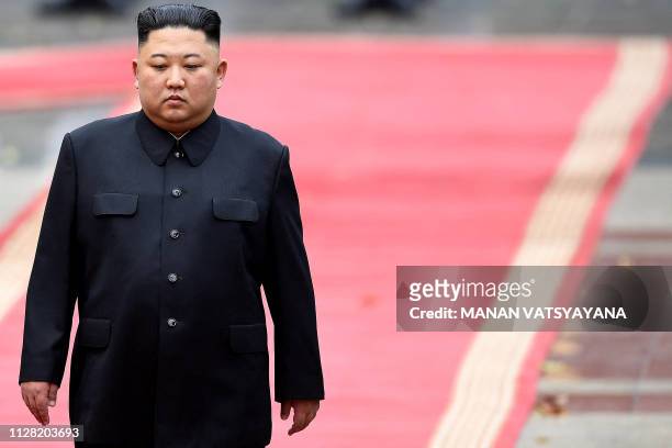 North Korea's leader Kim Jong Un attends a welcoming ceremony and review an honour guard at the Presidential Palace in Hanoi on March 1, 2019.