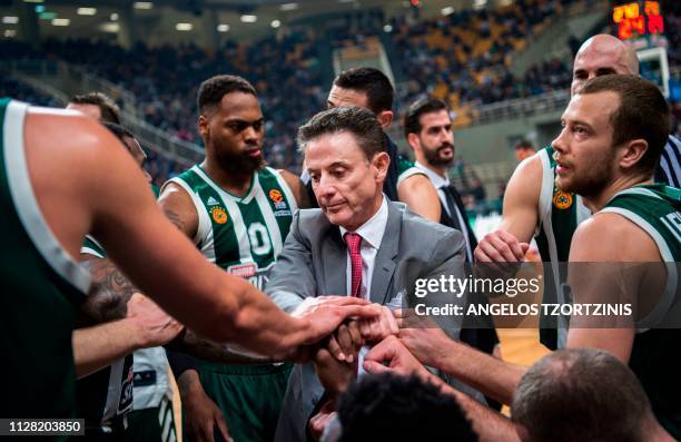 Coach of Panathinaikos Rick Pitino gives instructions to his players during a Euroleague basketball match between Panathinaikos and Anadolu Efes at...