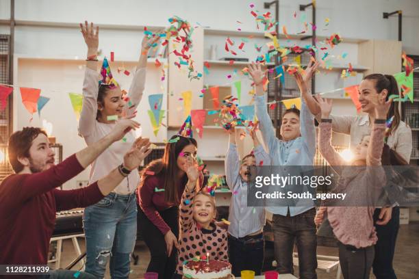 teachers and children throwing confetti on birthday - throwing cake stock pictures, royalty-free photos & images