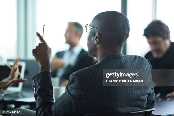 co-workers having meeting with laptop in conference room - large business meeting stock pictures, royalty-free photos & images