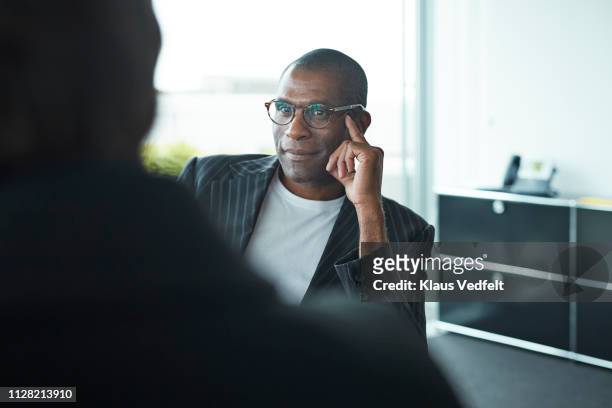 business people in big meeting room - back shot position stock pictures, royalty-free photos & images