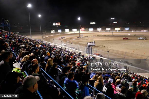 General view of the crowd in the grandstands during heat races for the Star Nursery 100 NASCAR K&N Pro Series West race on February 28, 2019 at The...