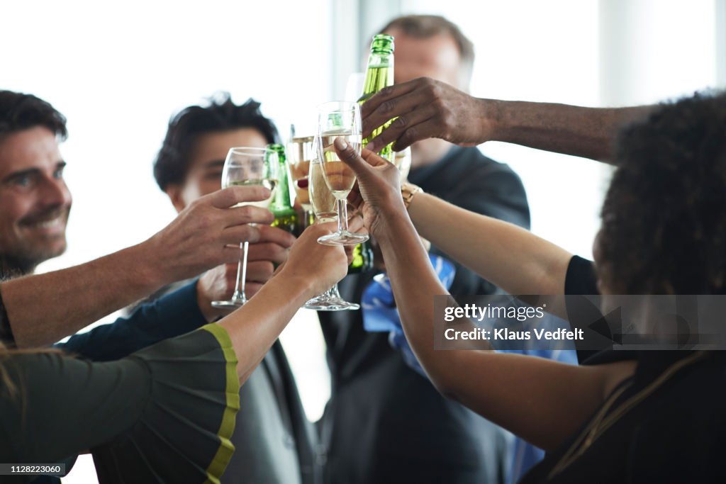 Corporate co-workers having drinks after meeting