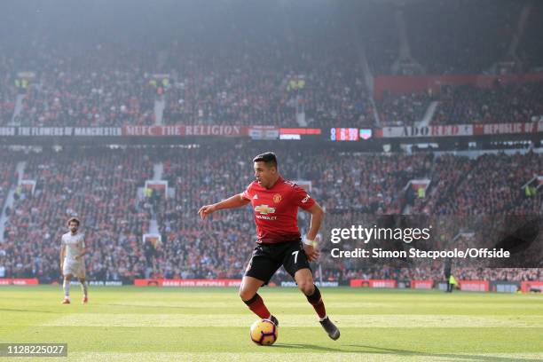 Alexis Sanchez of Man Utd in action during the Premier League match between Manchester United and Liverpool at Old Trafford on February 24, 2019 in...