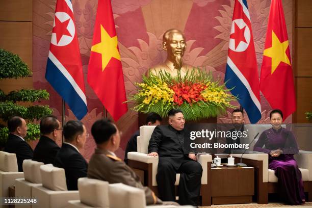 Kim Jong Un, North Korea's leader, left, speaks with Nguyn Th Kim Ngn, chairwoman of the National Assembly of Vietnam, during a bilateral meeting in...