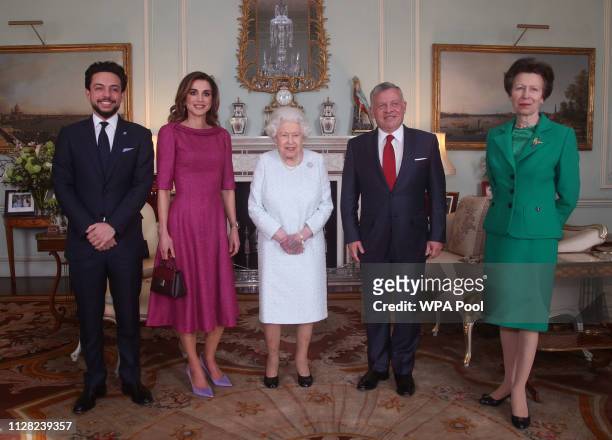 Crown Prince Hussein of Jordan, Queen Rania of Jordan, Queen Elizabeth II, King Abdullah II of Jordan and Princess Anne, Princess Royal during a...