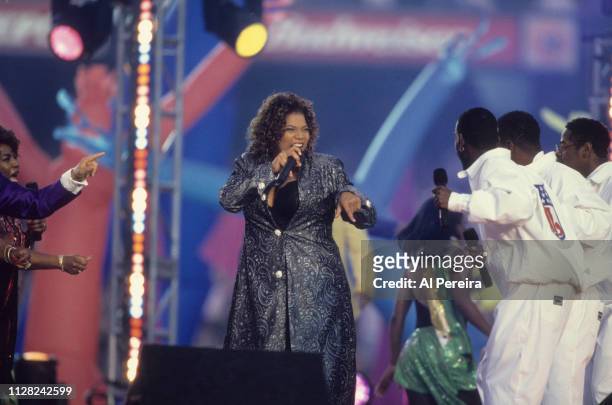 Queen Latifah performs at Halftime of the game between the Green Bay Packers and the Denver Broncos at Super Bowl 32 at Qualcomm Stadium on January...