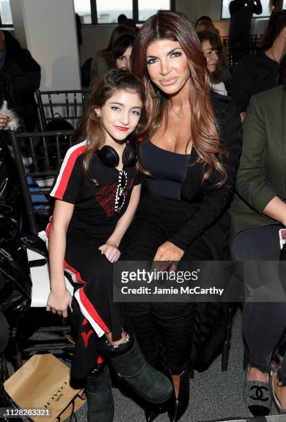 Audriana Giudice and Teresa Giudice attend the Cosmopolitan NYFW fashion show during New York Fashion Week at Tribeca 360 on February 08, 2019 in New...