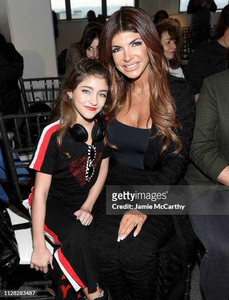 Audriana Giudice and Teresa Giudice attend the Cosmopolitan NYFW fashion show during New York Fashion Week at Tribeca 360 on February 08, 2019 in New...