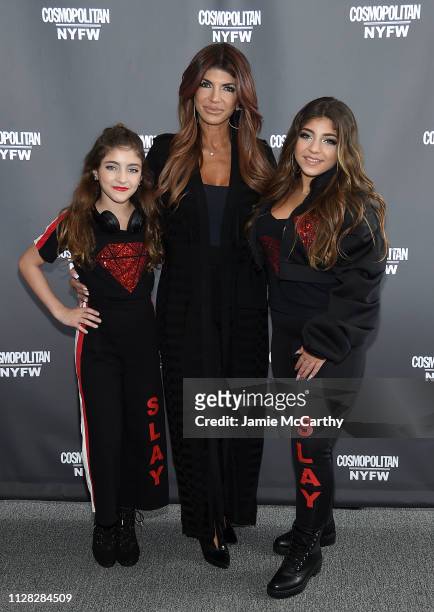 Audriana Giudice,Teresa Giudice and Milania Giudice attend the Cosmopolitan NYFW fashion show during New York Fashion Week at Tribeca 360 on February...