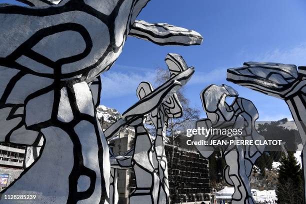 Picture taken on February 28 at the ski resort of Flaine, central-eastern France, shows the replica of a sculpture entitled "Le Boqueteau des 7...
